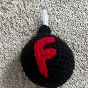 Handmade Crocheted Black Bomb with Red Letter